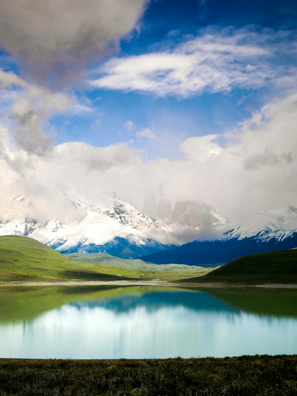 a large body of water surrounded by mountains