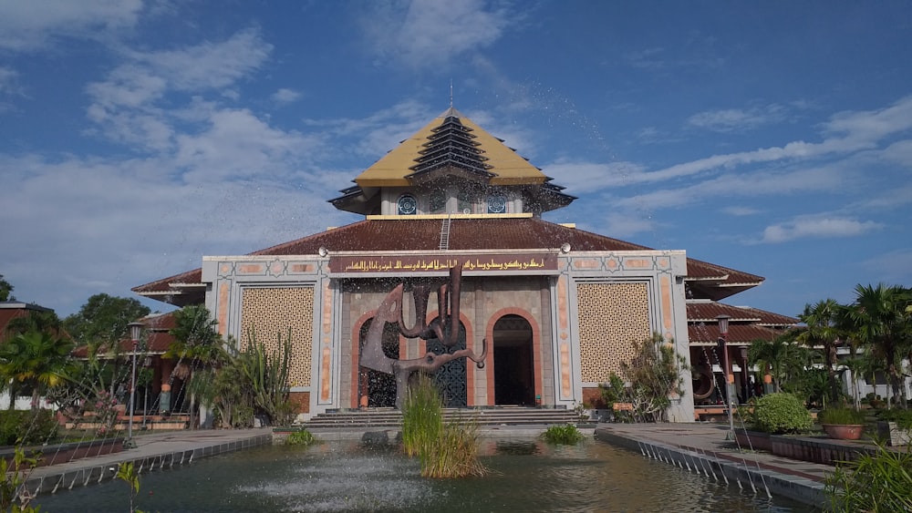 a building with a fountain in front of it