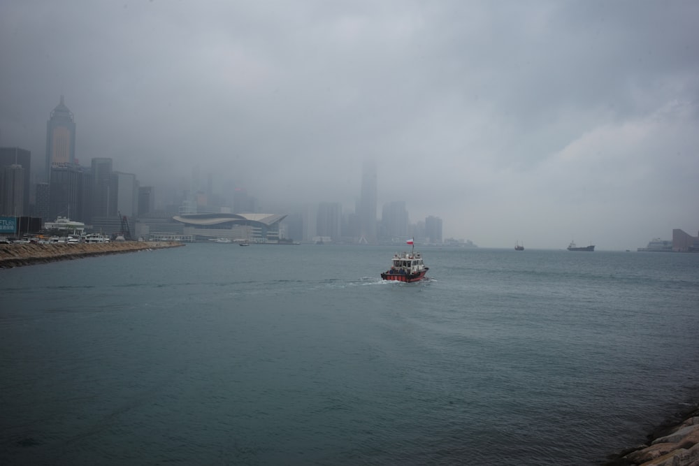 a boat in the middle of a body of water