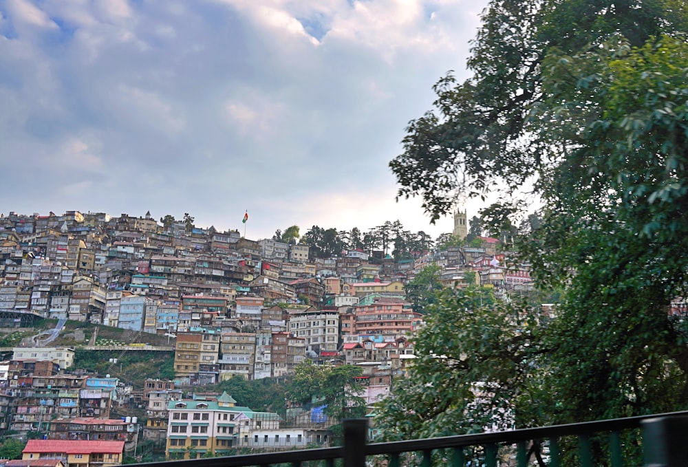 a view of a city with a hill in the background