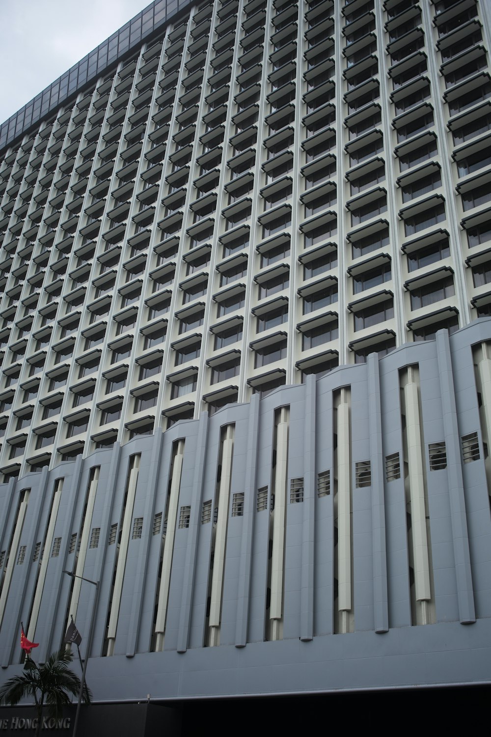 a tall building with many windows on the side of it