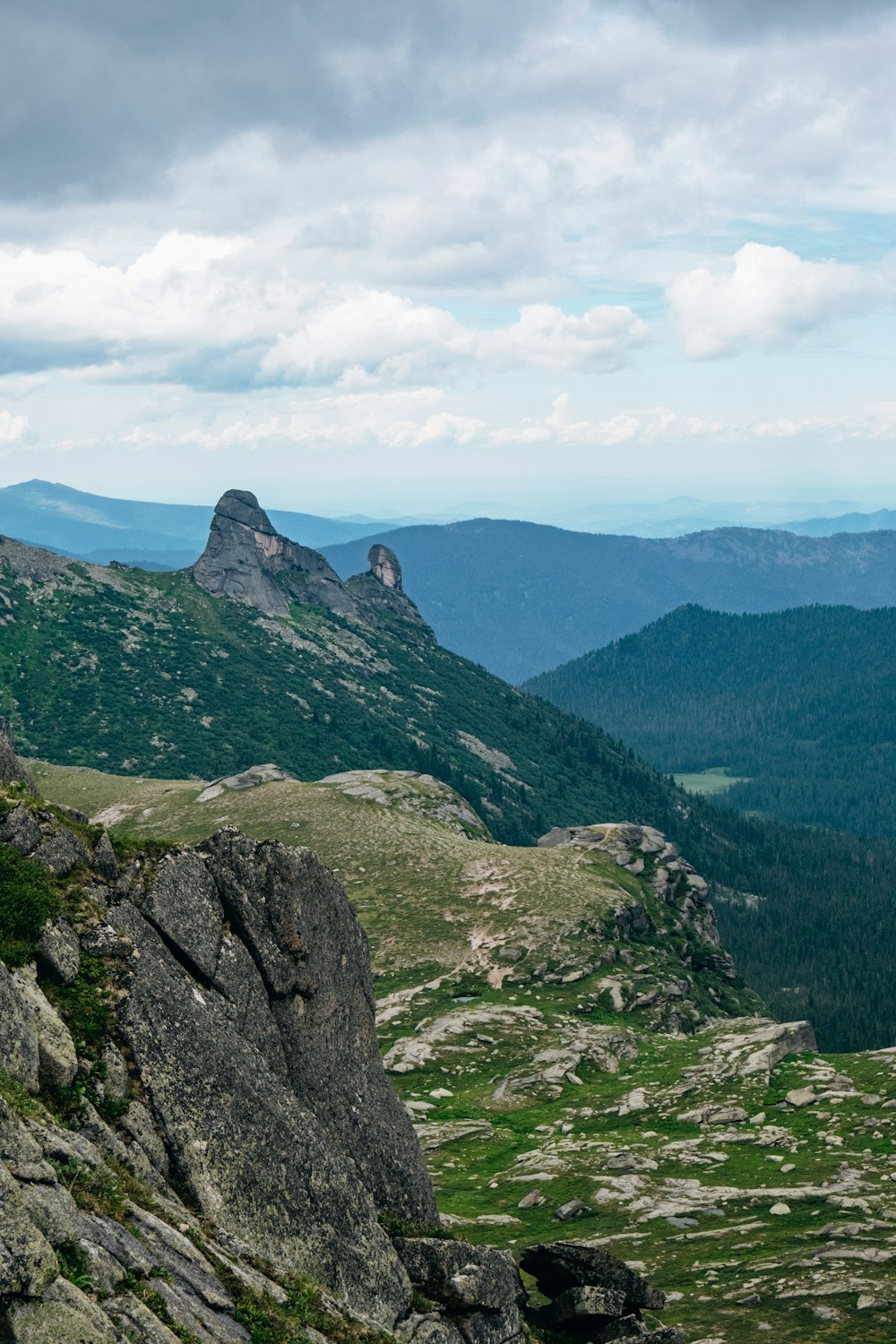 a view of a mountain range from a high point of view