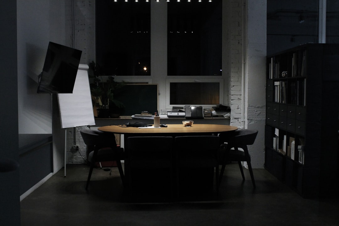 Dark room with table and chairs