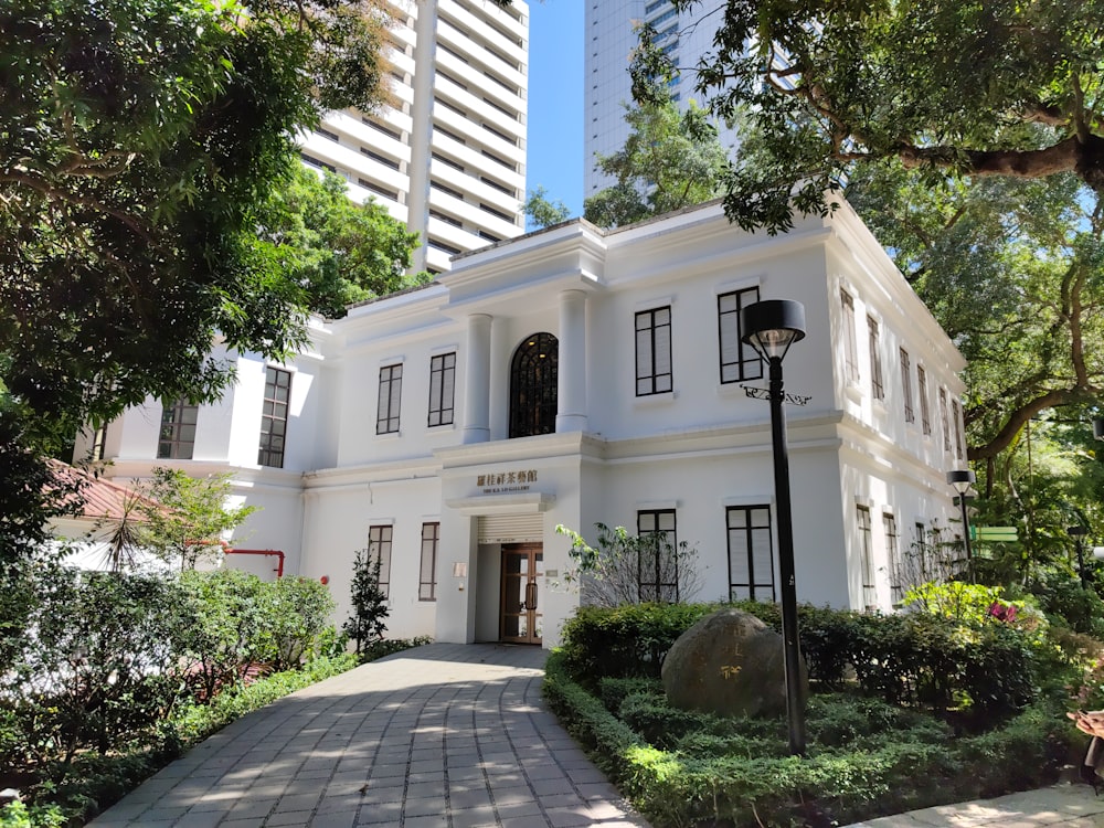 a large white house with lots of windows