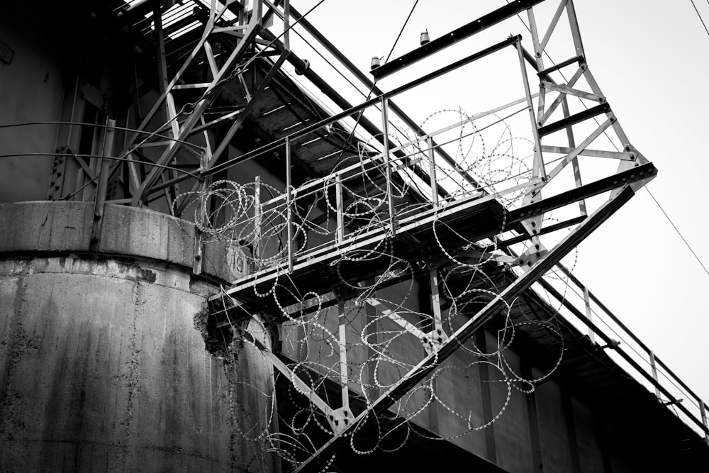 a black and white photo of a steel structure