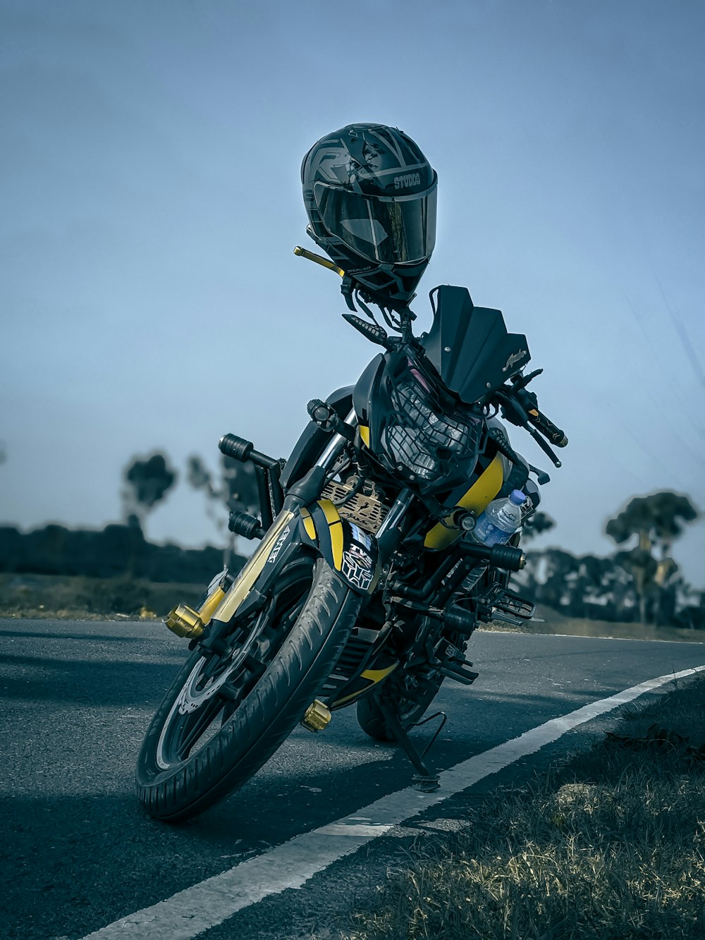 a person riding a motorcycle on a road