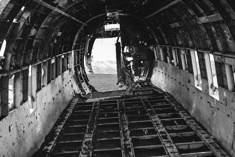 a black and white photo of the inside of an airplane