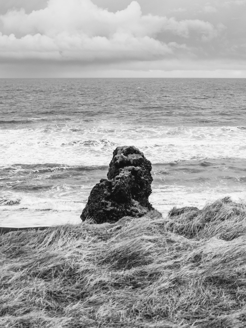 a black and white photo of the ocean