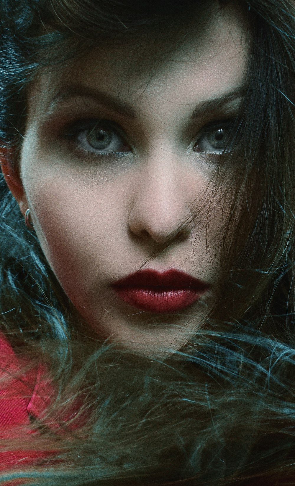 a close up of a person with long hair