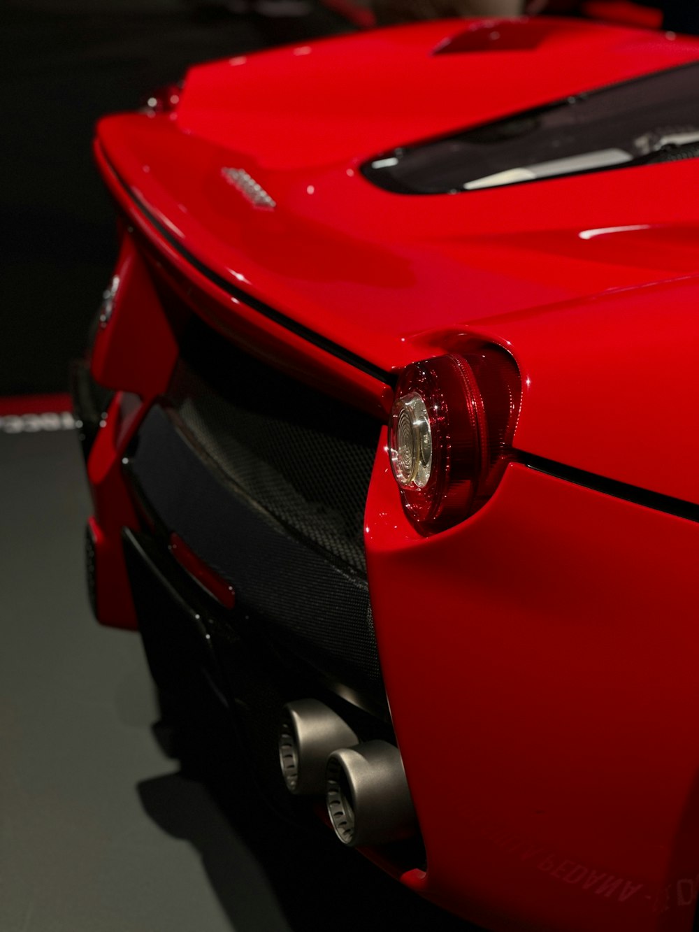 a close up of a red sports car