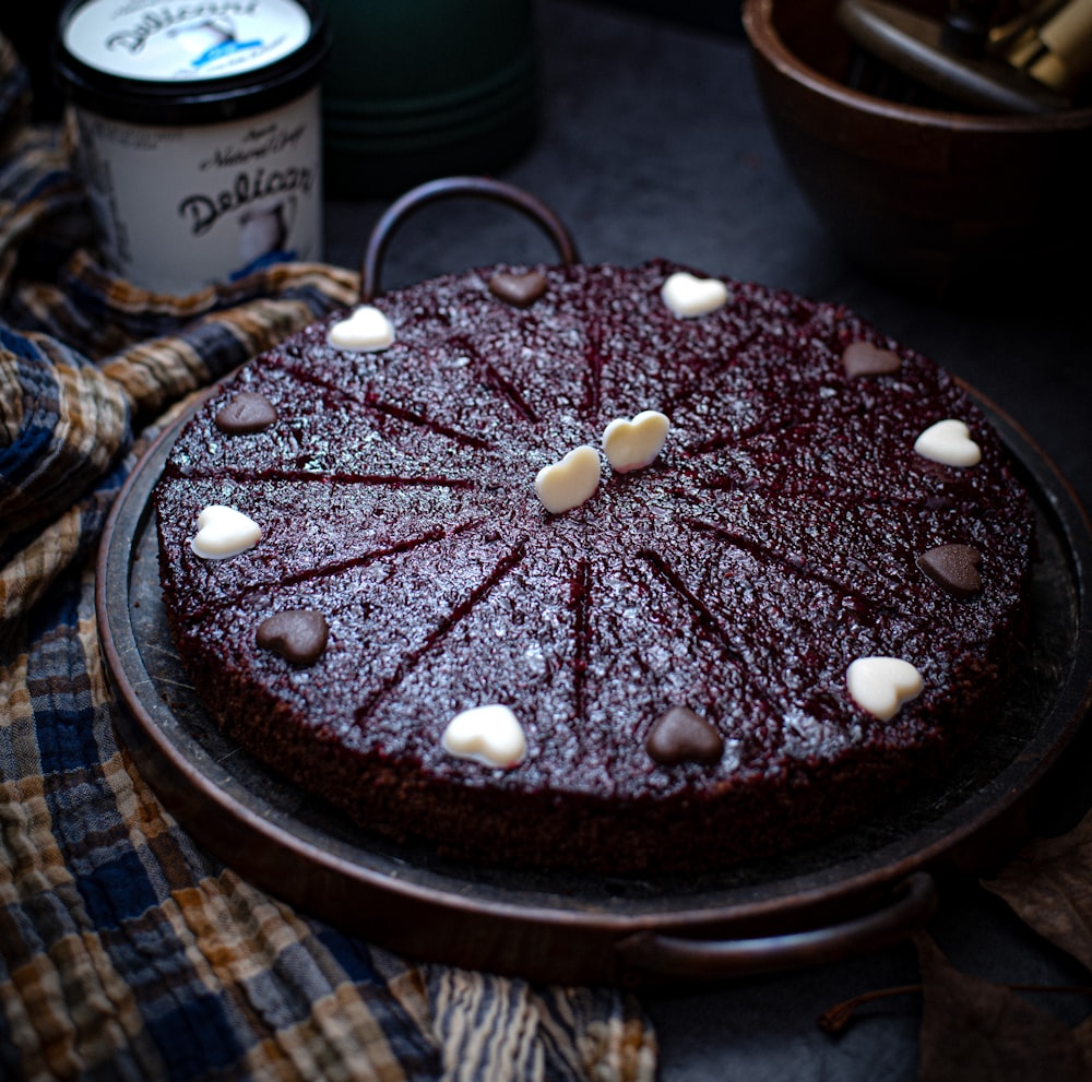 a chocolate cake with marshmallows on top of it