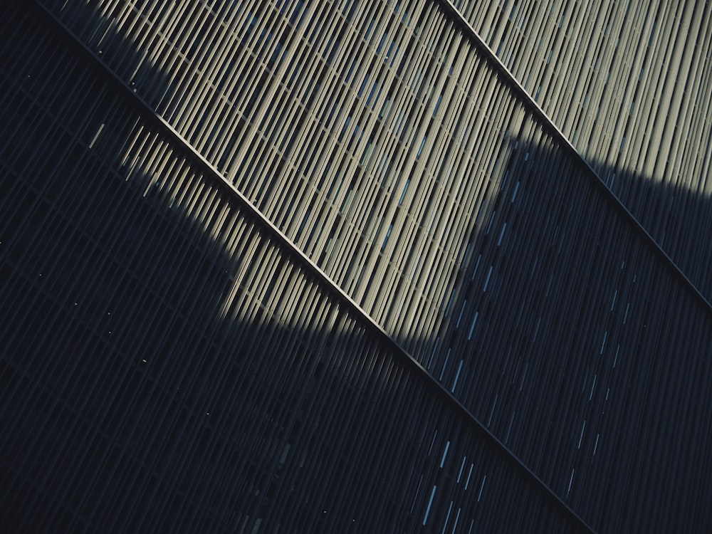 a shadow of a clock on a wall