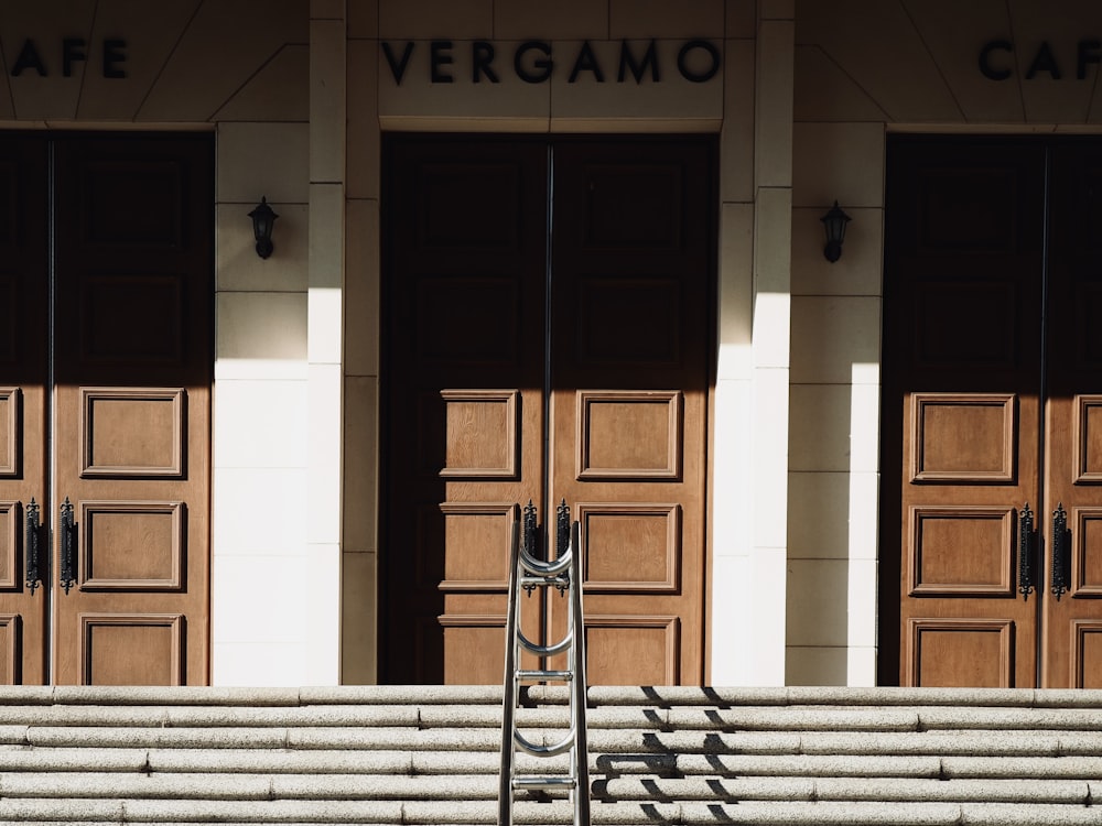 a set of stairs leading up to two doors