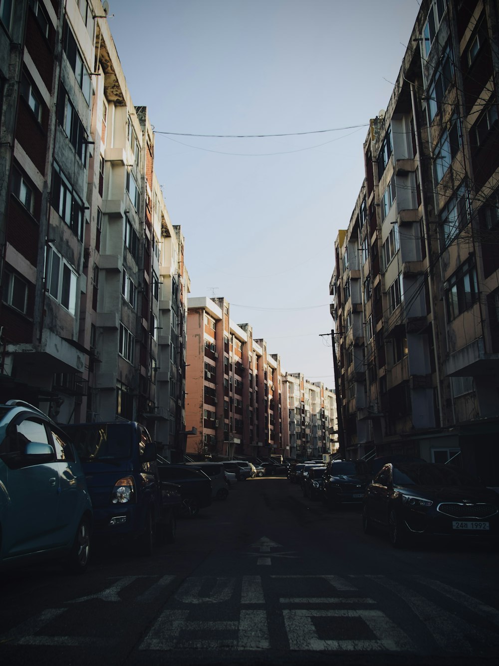 a city street filled with lots of tall buildings