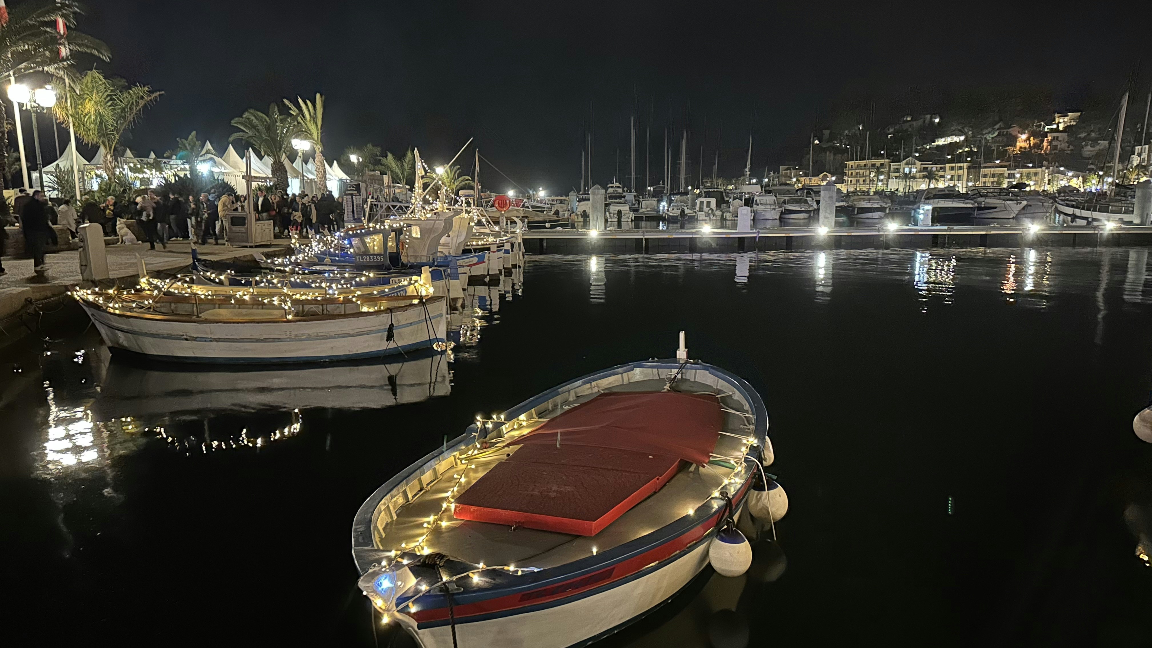 a group of boats that are sitting in the water