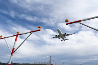 an airplane is flying low to the ground