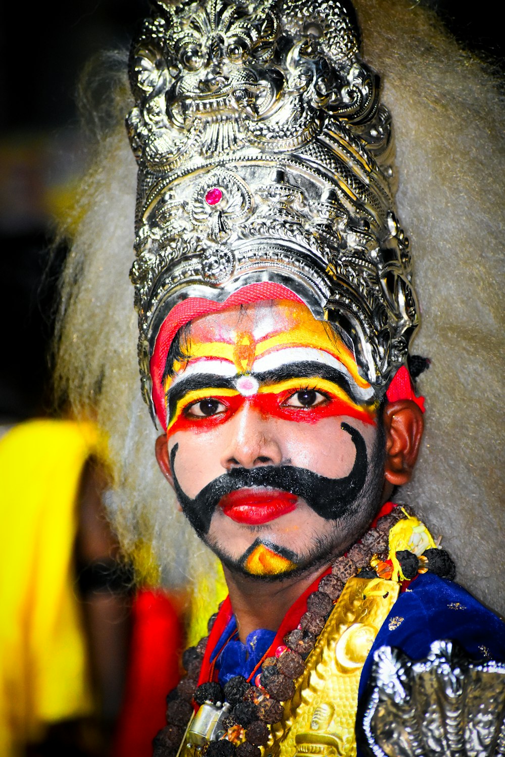 a man in a costume with a beard and a moustache