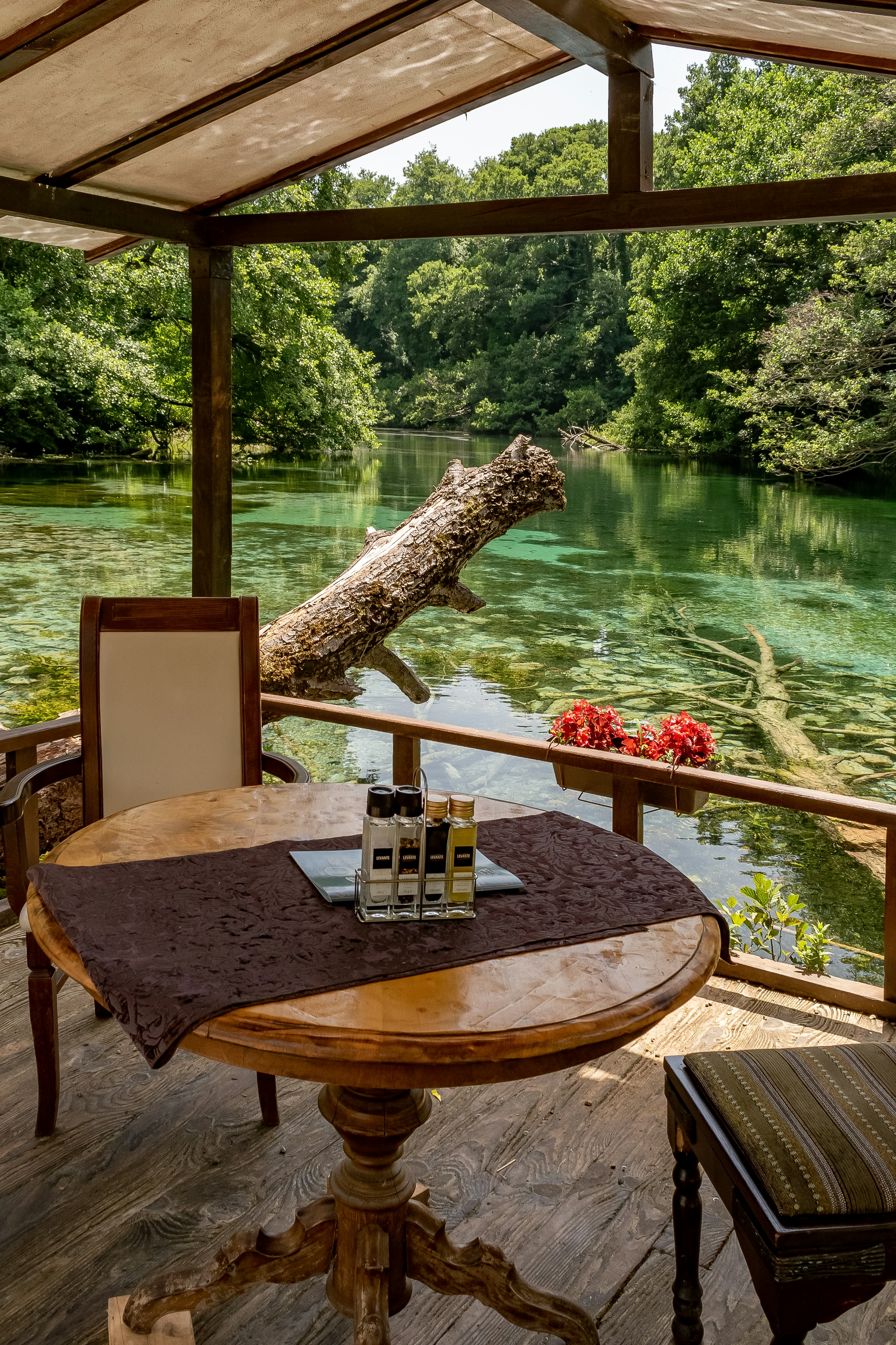 a table with two bottles of wine on top of it
