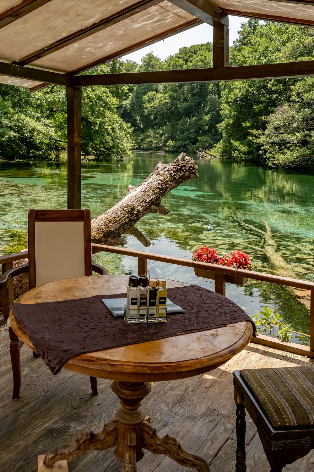 a table with two bottles of wine on top of it