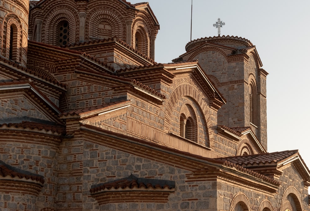 an old church with a steeple and a clock tower