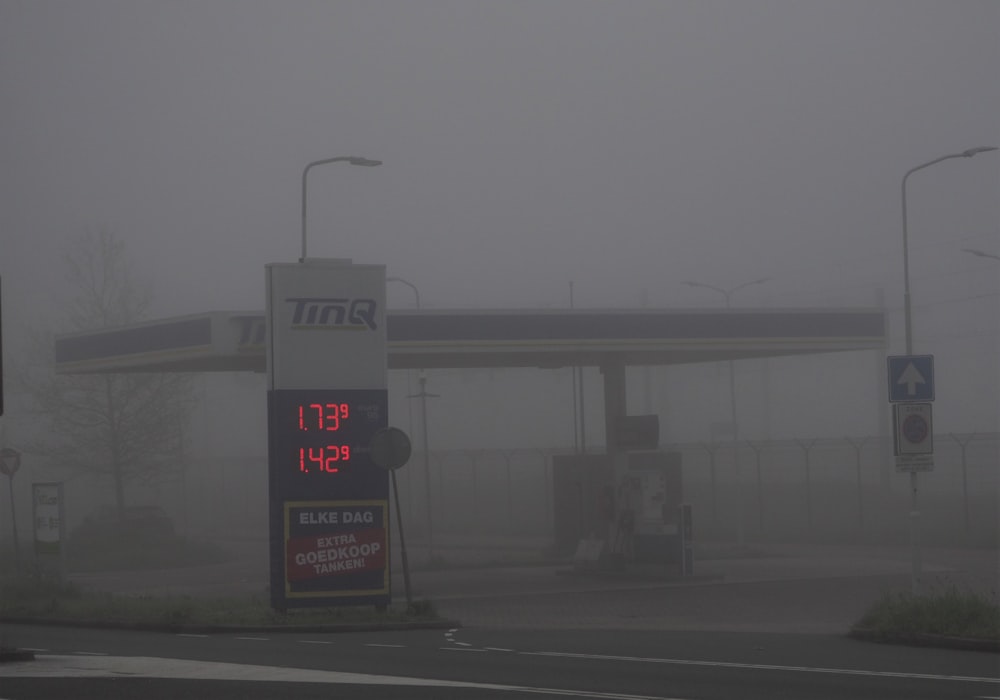 a gas station on a foggy day