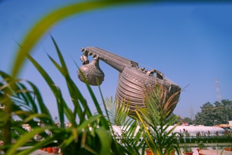 a statue of a large boat with a long nose