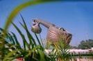 a statue of a large boat with a long nose
