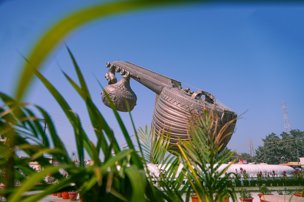 a statue of a large boat with a long nose