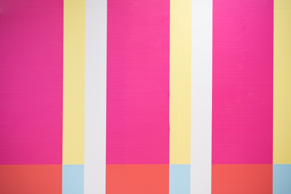 a painting of multicolored stripes on a wall