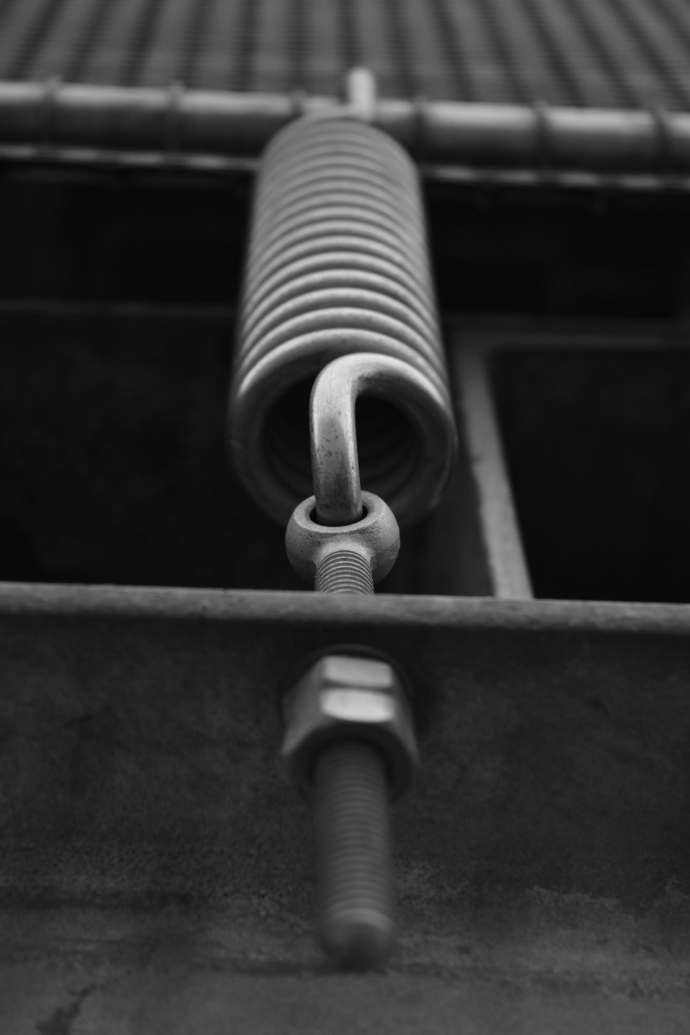 a black and white photo of a metal object