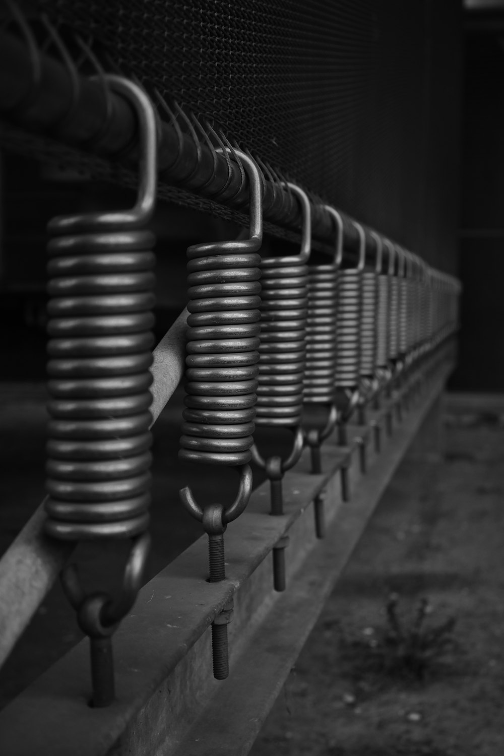 a row of coils on the side of a building