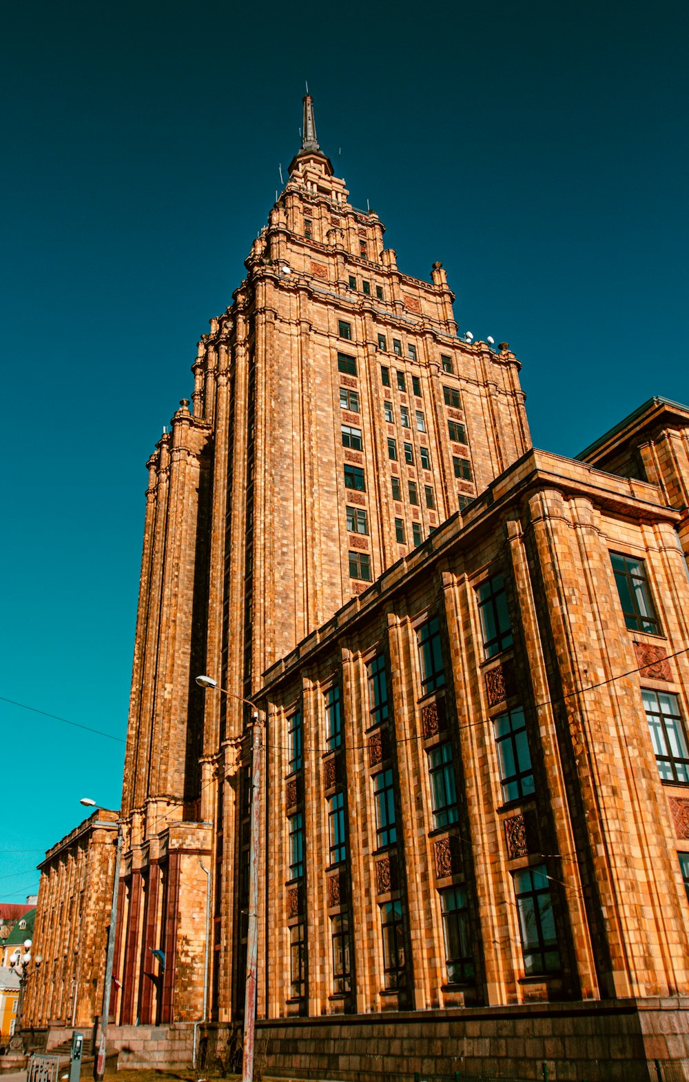 a tall building with a clock on the top of it