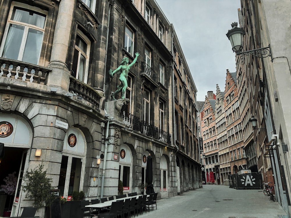 a city street with a statue of a man on a horse