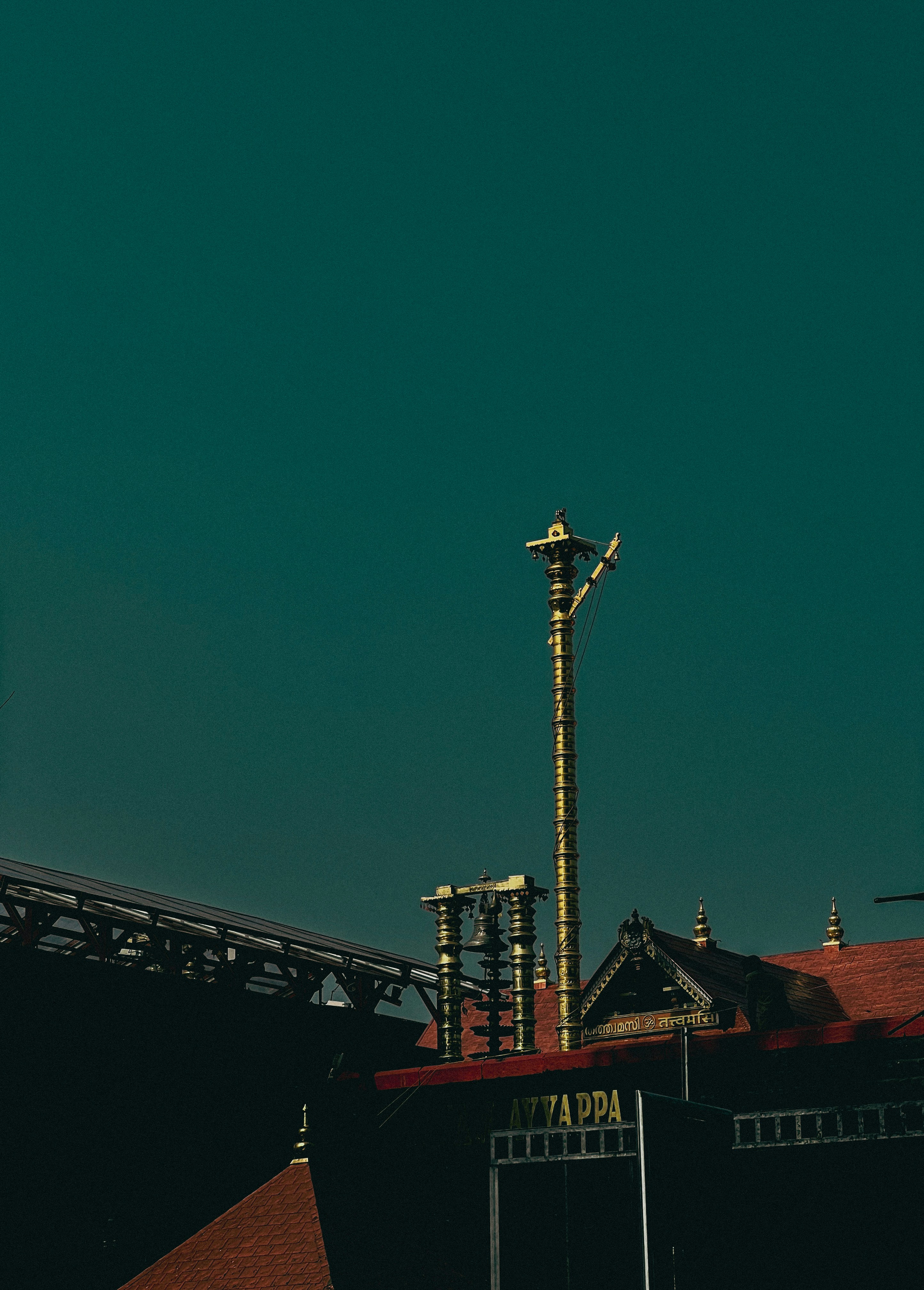 a tall tower with a clock on top of it