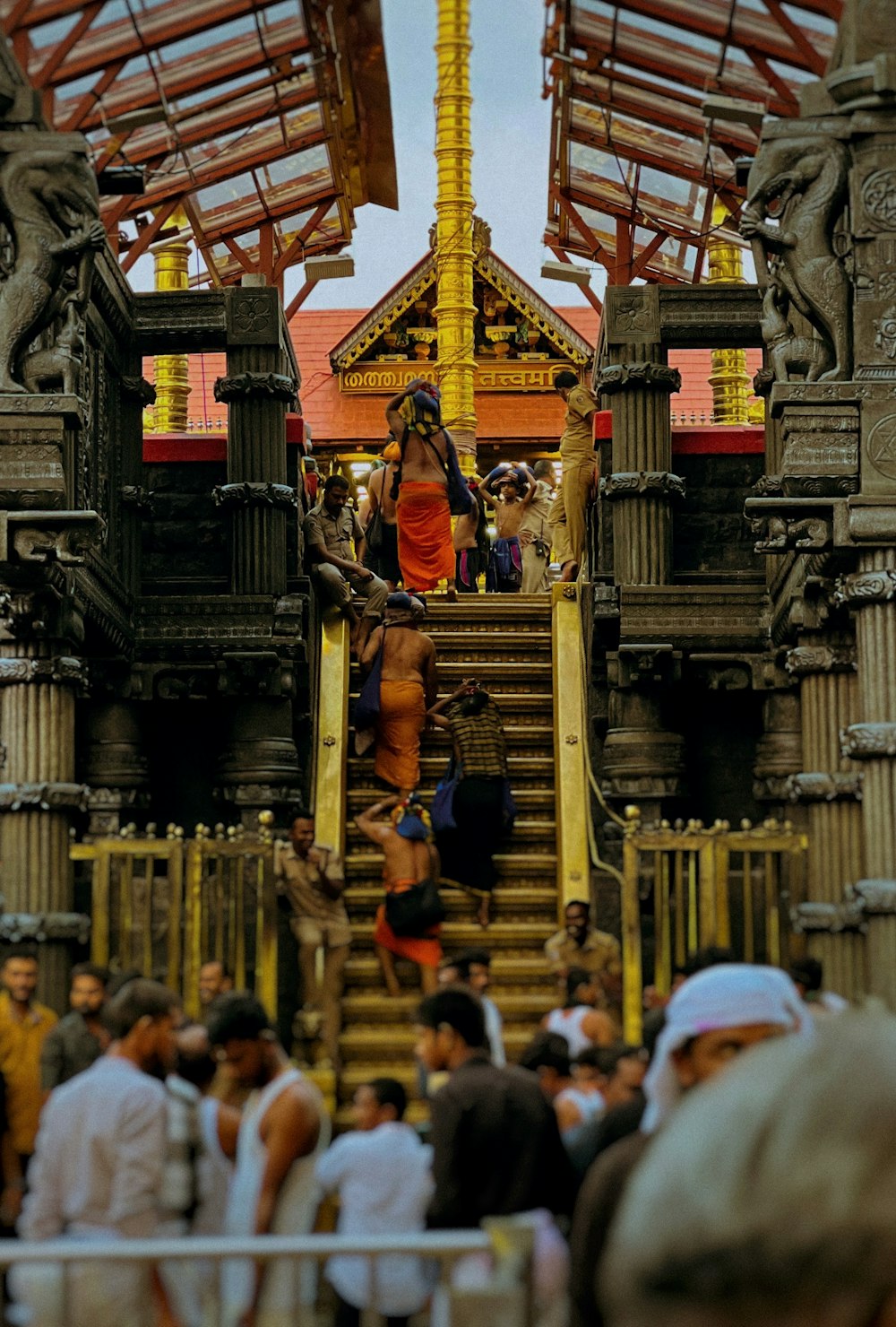 a group of people walking up and down a set of stairs