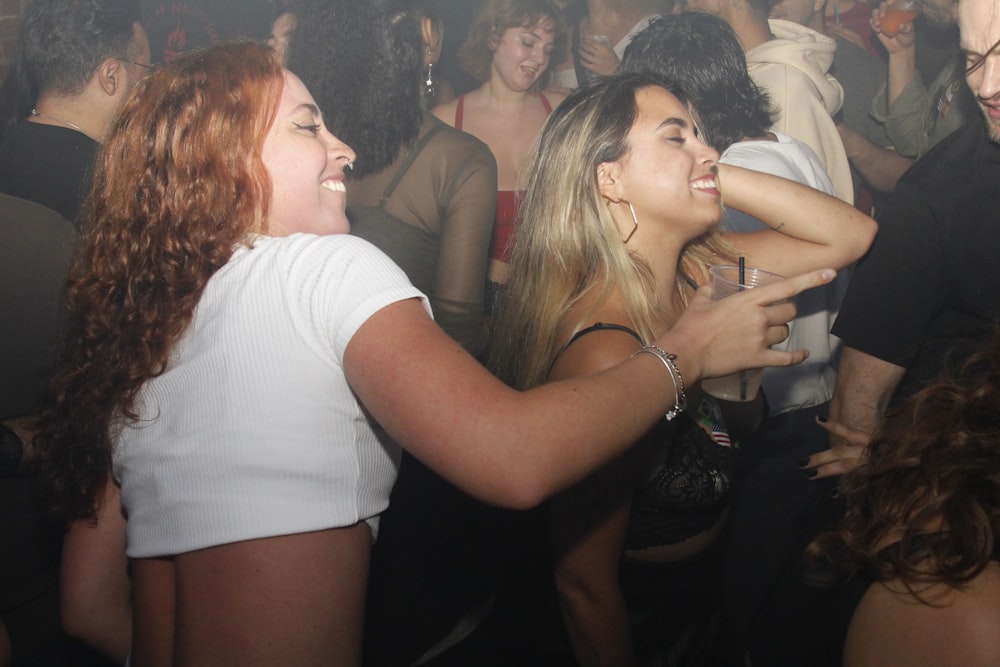 a group of people dancing at a party