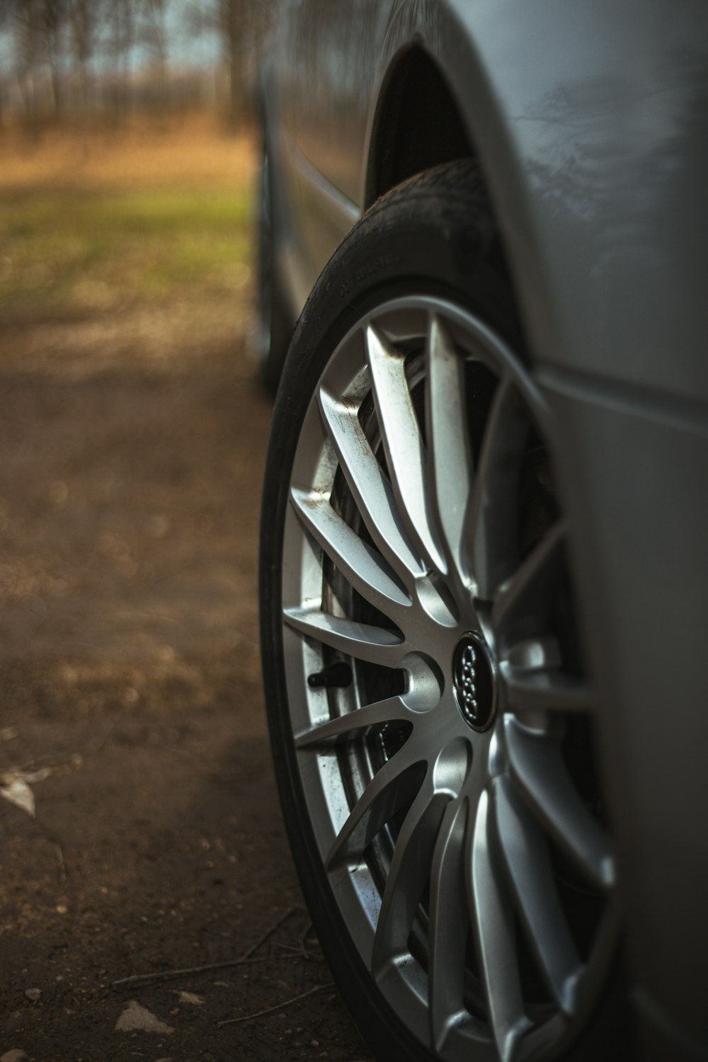 a close up of the spokes of a car