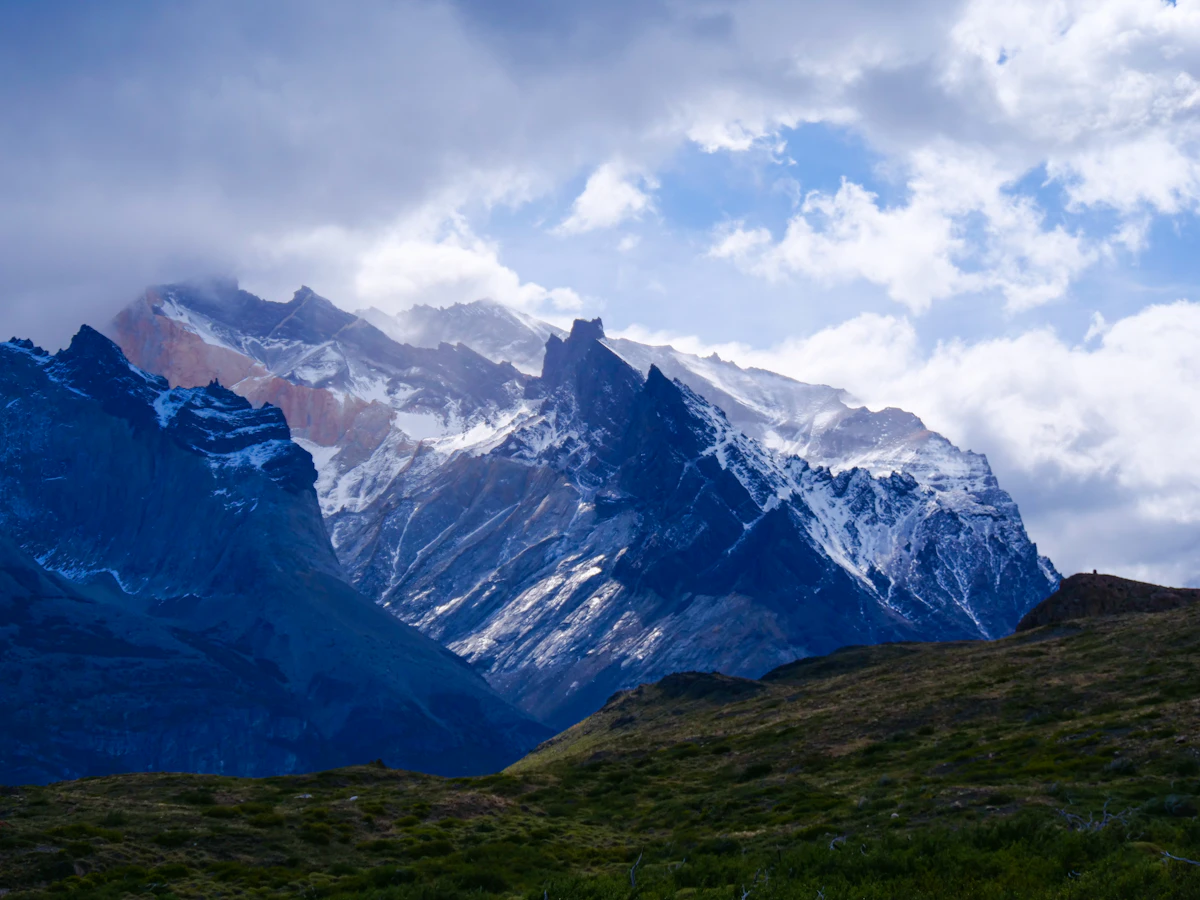 Private trekking camp with Torres del Paine towers in the background at sunrise