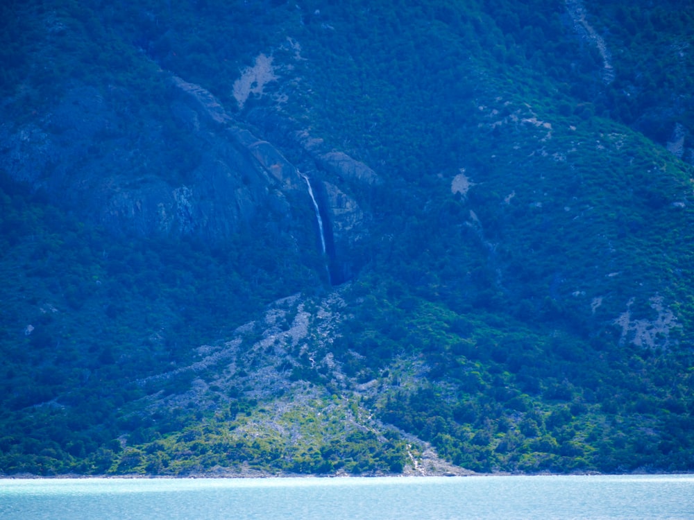 a boat floating on top of a large body of water