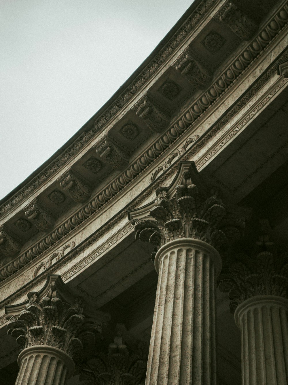 a black and white photo of a building with columns