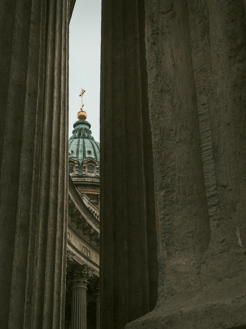 a tall building with a dome on top of it