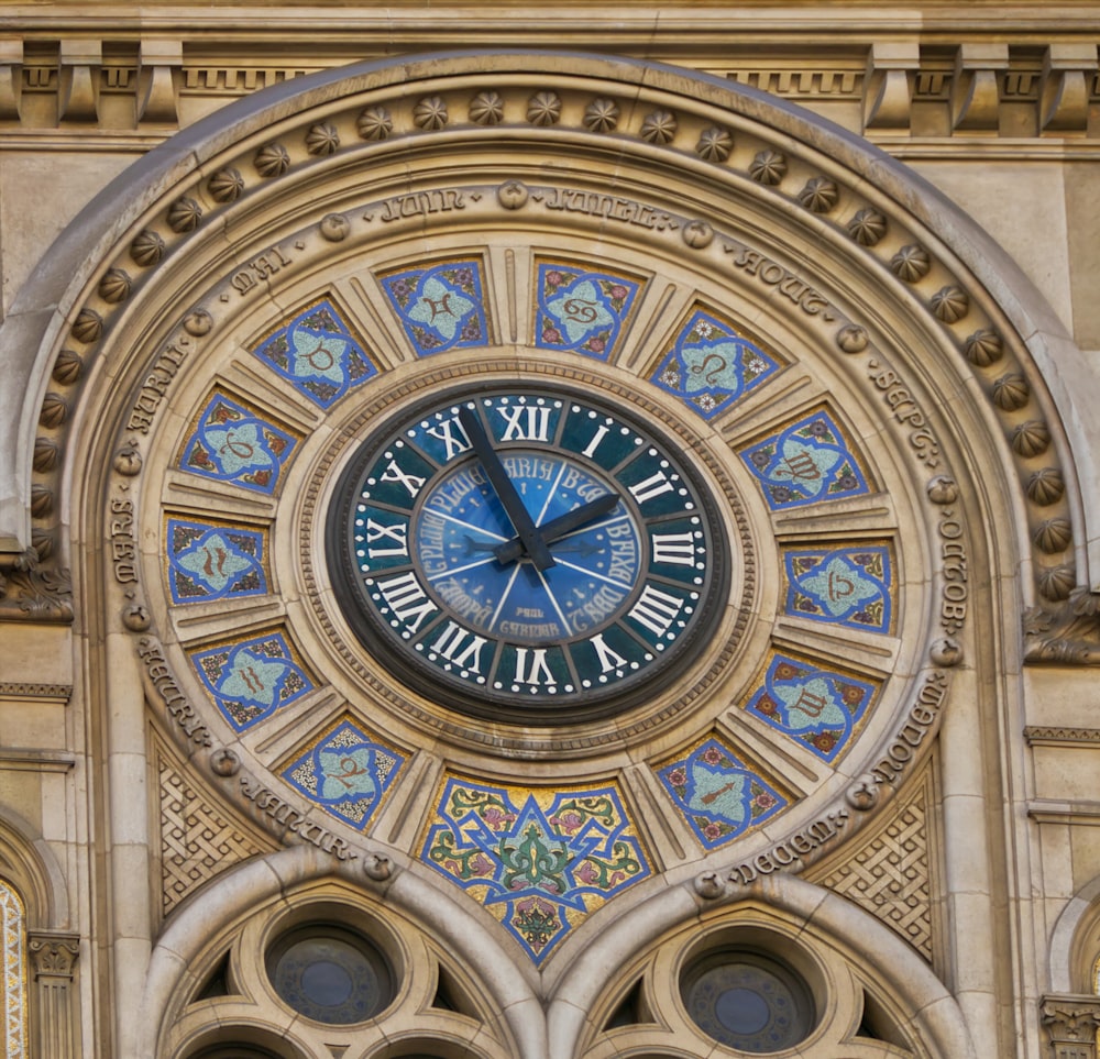 a clock that is on the side of a building