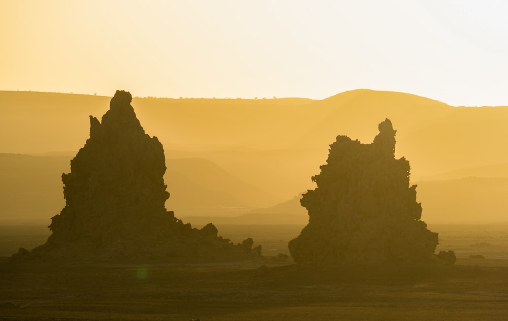 a group of rock formations in the middle of a desert