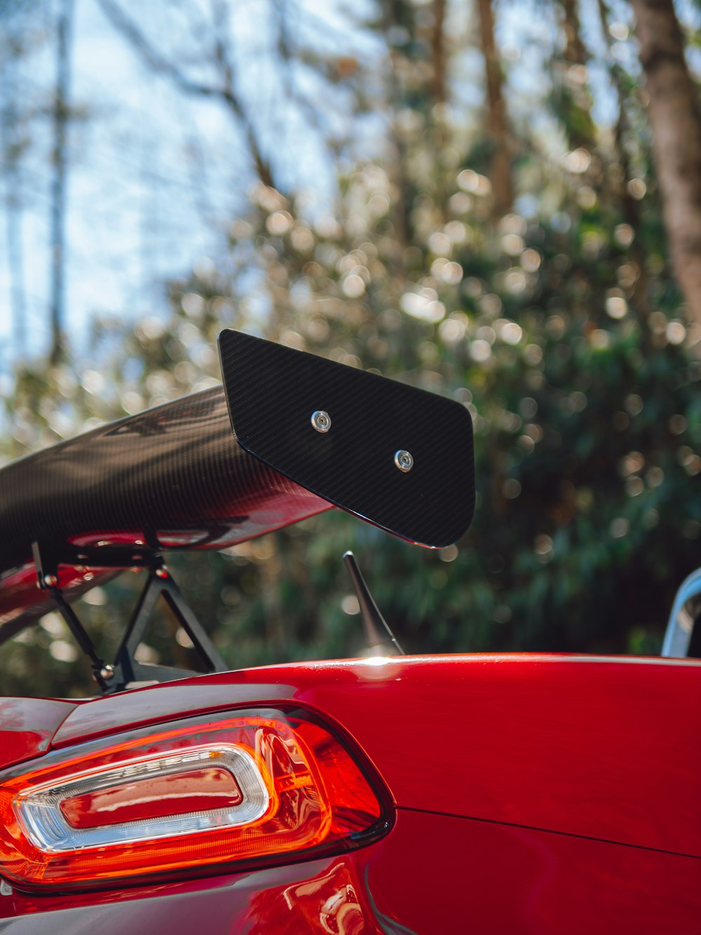 a close up of a red sports car