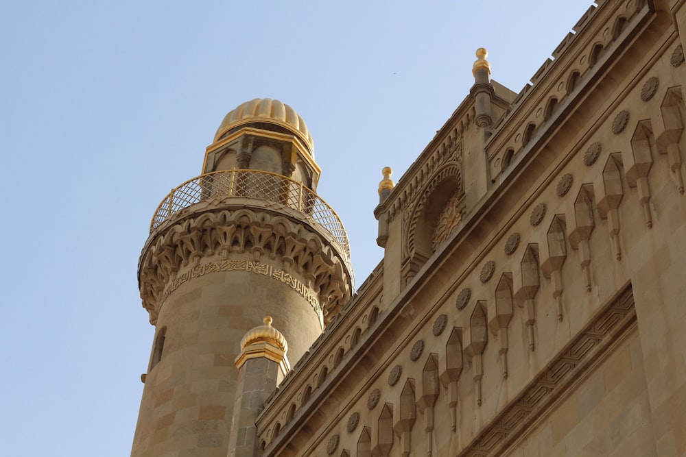 a very tall building with a clock on it's side