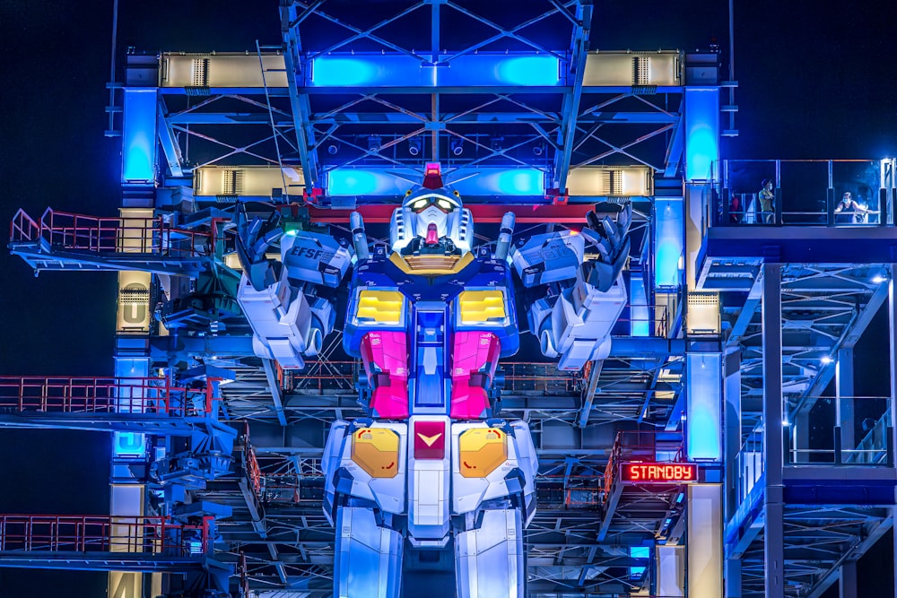 a giant robot that is standing in the dark