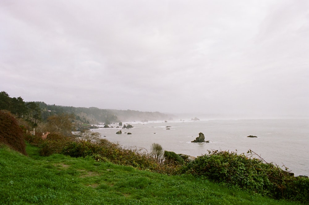 a view of a body of water from a hill