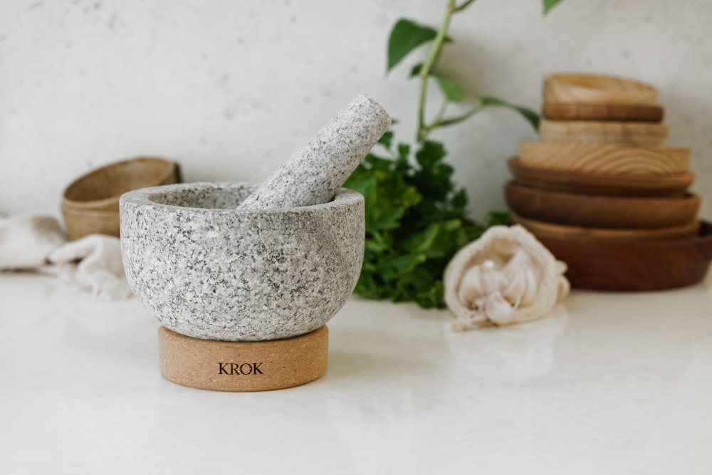 a mortar and pestle set up on a counter