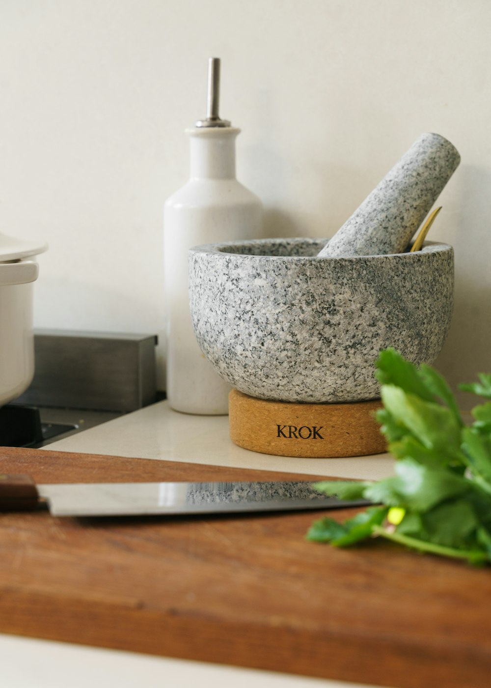 a kitchen counter with a cutting board and knife