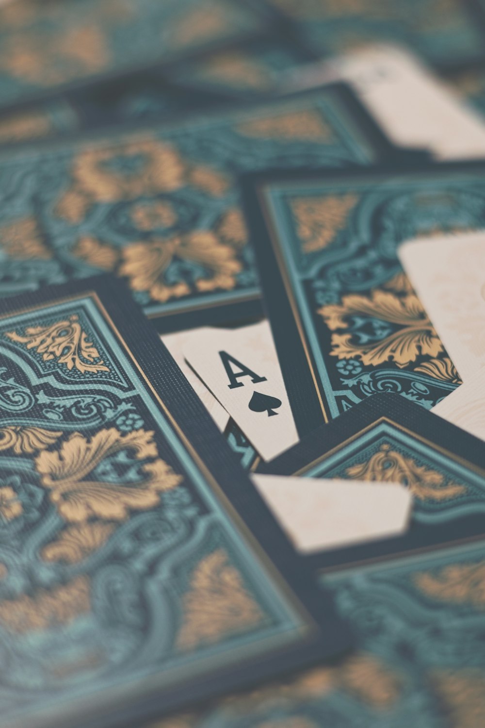 a close up of playing cards on a table